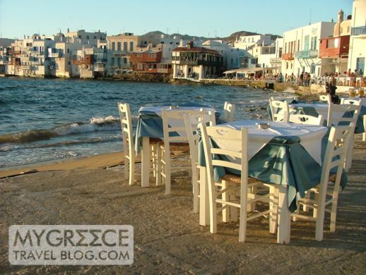Tables next to the seaside at a taverna in Little Venice in Mykonos Town
