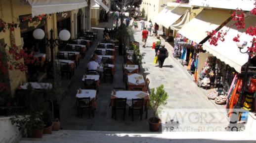 tavernas and shops on a street in Kos Town