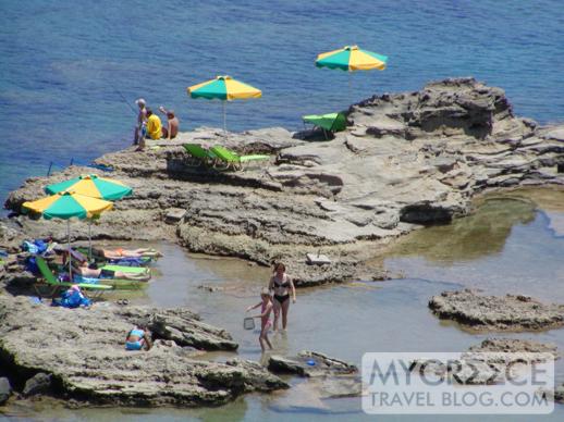 beach chairs and umbrellas near Kalithea on Rhodes