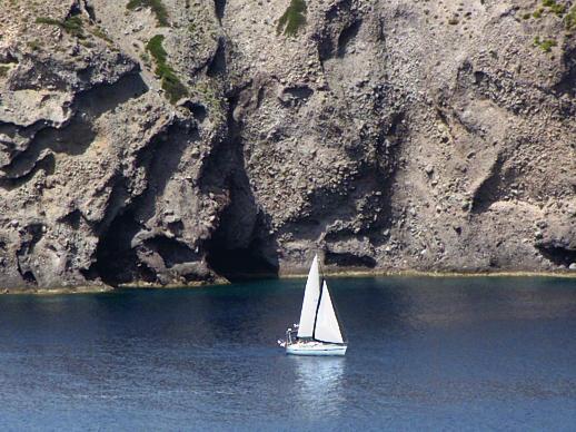 sailboat off the coast of Milos