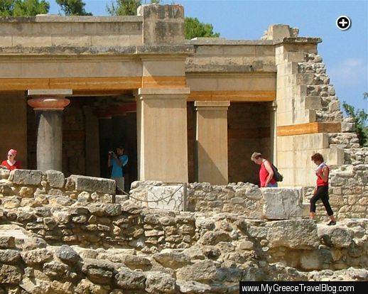 Tourists explore the ruins of Knossos Palace near Heraklion on Crete