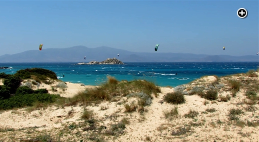 Kitesurfers challenge the wind and wavs off Mikri Vigla beach on Naxos