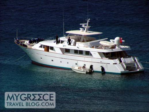 A yacht anchored in Psarou Bay