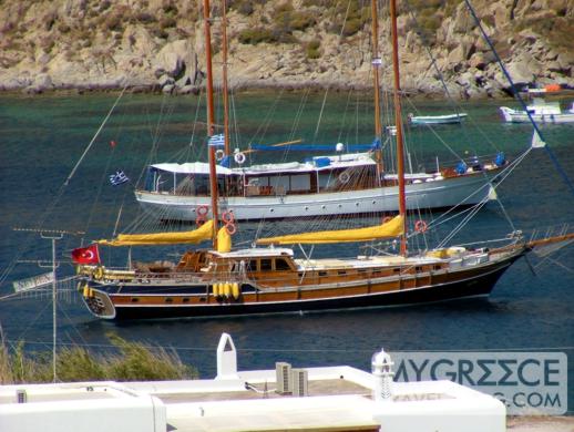 two yachts in Psarou bay