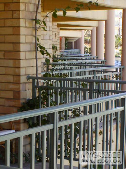 a row of balconies at the Candia Maris Resort & Spa Crete