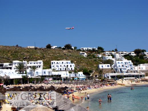 Air Berlin jet above Platis Gialos beach Mykonos