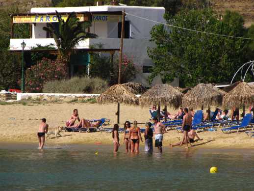 People at Mylopotas Beach on Ios island 