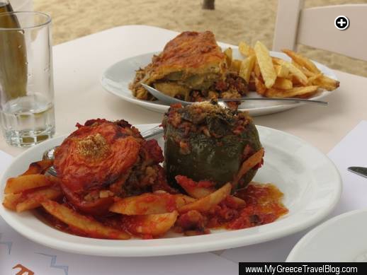 Stuffed tomatoes and peppers (front) and moussaka with fries at Nikolas Taverna on Mykonos