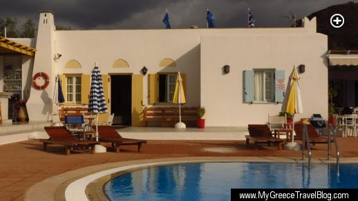 Swimming pool terrace view of the main building at the Lianos Village Hotel complex on Naxos