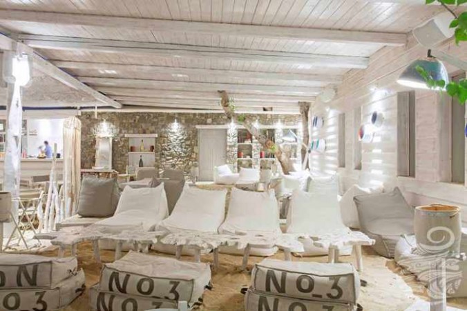A chic lounge area at Panormos Mykonos Beach Resort