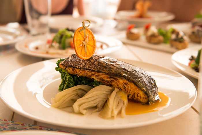 Gourmet cuisine from the menu at Panormos beach restaurant and bar