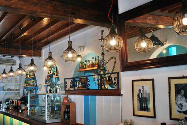 Zorbas restaurant interior Mykonos photo from Pente Studio Facebook page