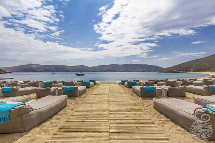 beach loungers at Panormos Mykonos Beach Resort