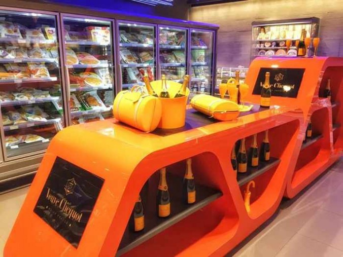 Facebook photo of a Veuve Cliquot champagne display at the Flora supermarket at Mykonos Town