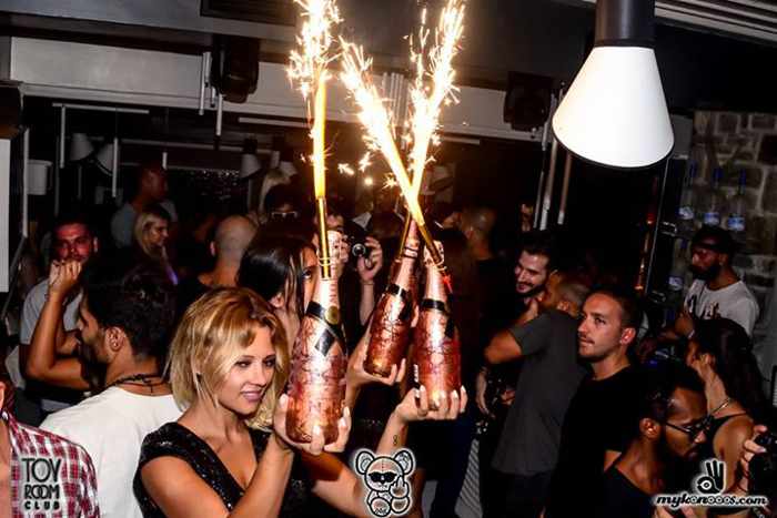 champagne bottles at Toy Room Club Mykonos in a Facebook photo 2 by   at Toy Room Club Mykonos in a Facebook photo 2 by  mykonooos dot com | MY GREECE TRAVEL BLOG