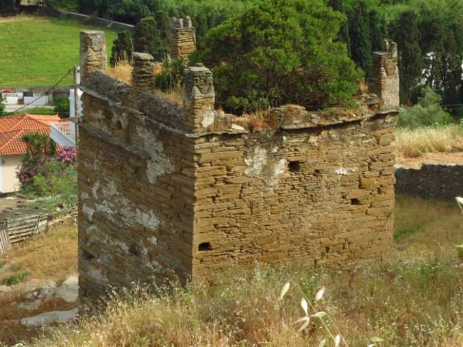 an old stone tower in Andros Town