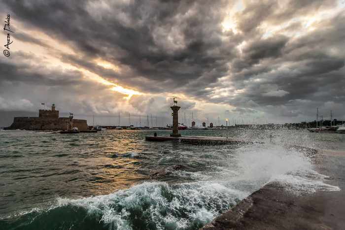 Aneza Palaiou photo of winter stormclouds and waves at Mandraki harbour of Rhodes