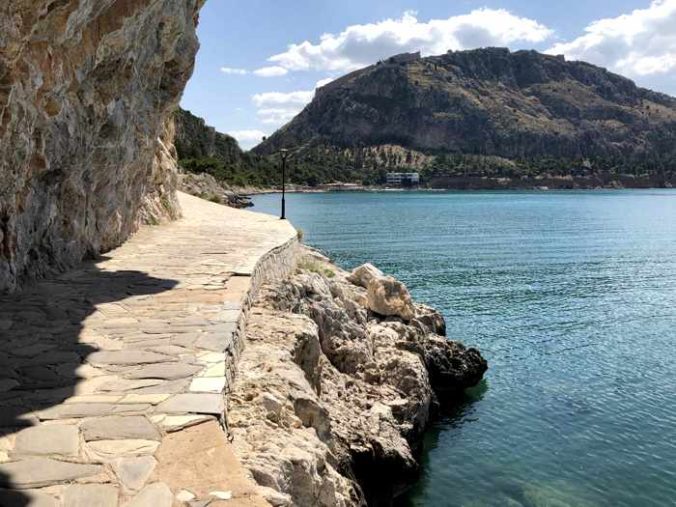 Greece, Peloponnese, Argolida, Nafplio, Arvanitia promenade, path, walkway, coast, tunnel, passageway