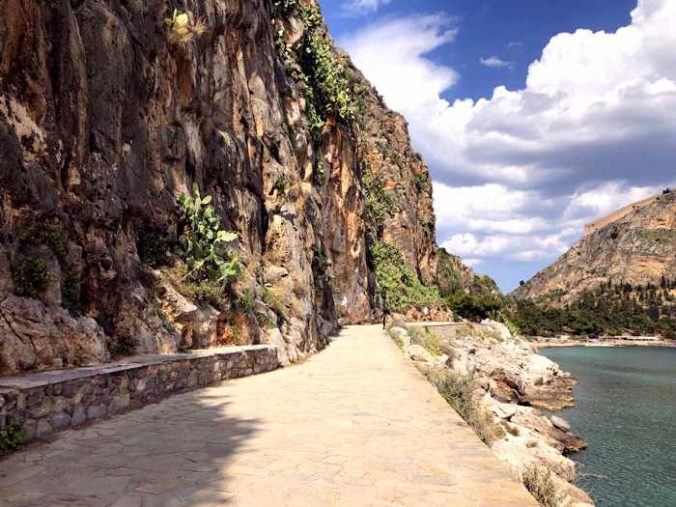 Greece, Peloponnese, Argolida, Nafplio, Arvanitia promenade, path, walkway, coast, tunnel, passageway