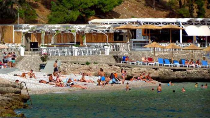 Greece, Peloponnese, Nafplio, Arvanitia, Arvanitia beach, beach, seaside, coast, sunbathers, swimmers, sea,