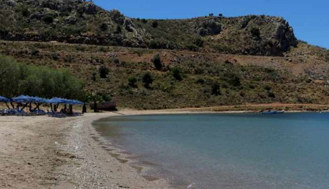 Greece, Peloponnese, Nafplio,Karathona, Karathona beach, beach, bay, seaside, shore, coast, sunbeds, loungers, beach umbrellas,