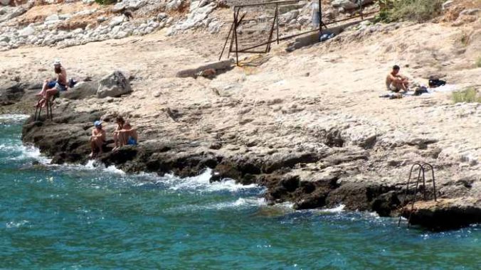 Greece, Peloponnese, Nafplio, Arvanitia, Arvanitia beach, shore, coast, seaside, sunbathers