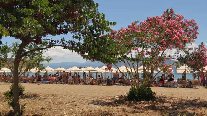 Greece, Peloponnese, Nafplio,Karathona, Karathona beach, beach, bay, seaside, shore, coast, sunbeds, loungers, beach umbrellas, 