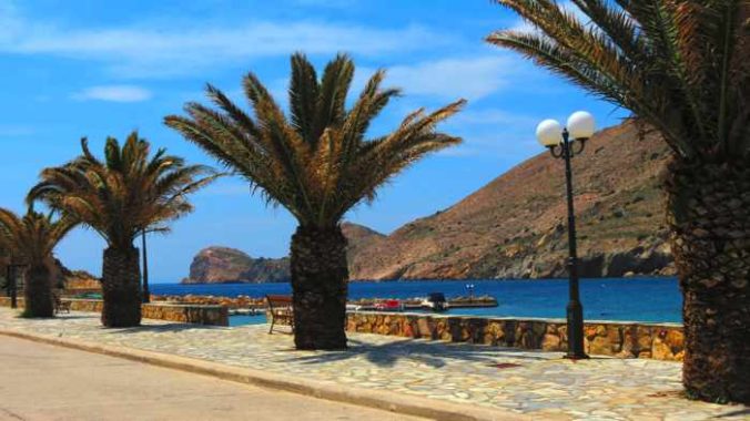 Greece, Greek islands, Cyclades, Siros,Syros, Syros island, Galissas, village, harbourside, seaside, promenade, walkway, palm trees