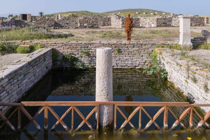 Photograph of the Antony Gormley sculpture Cast III on Delos island