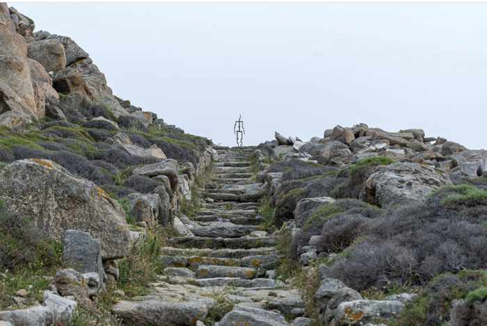 From the NEON page on Instagram a photo of an Antony Gormley sculpture atop Mount Kynthos on Delos island Greece