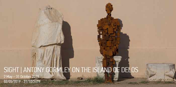 One of the Antony Gormley iron sculptures on Delos island in 2019