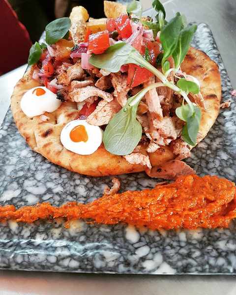 Cantina Mykonos Facebook photo of the restaurants signature pita with lamb souvlaki