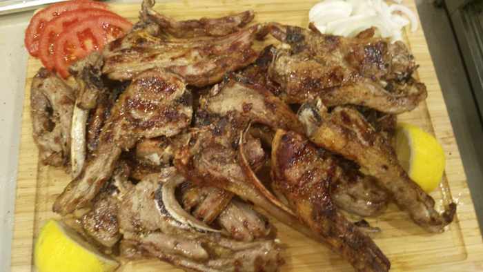 Grilled meat dish photo from the Taverna Kandavlos page on Facebook