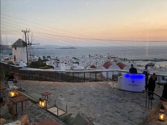 Nusr-Et Mykonos steakhouse bar patio overlooking Mykonos Town