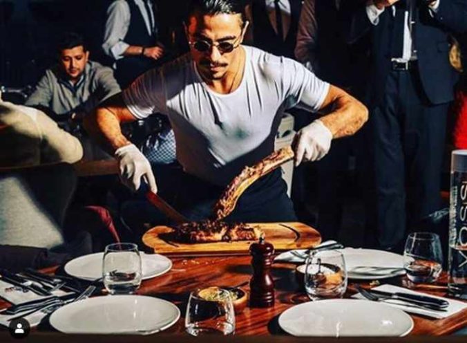 Nusret Mykonos social media photo of Salt Bae in action in the restaurant