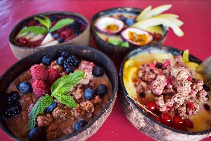 Zama Mykonos Instagram page photo of coconut and granola bowls