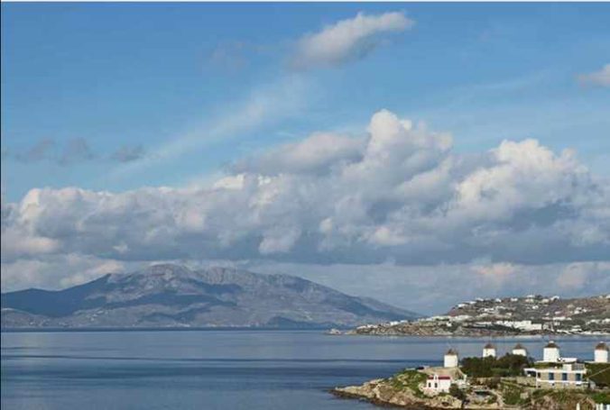 Crystal View Mykonos view of the Mykonos windmills and Tinos island in the distance