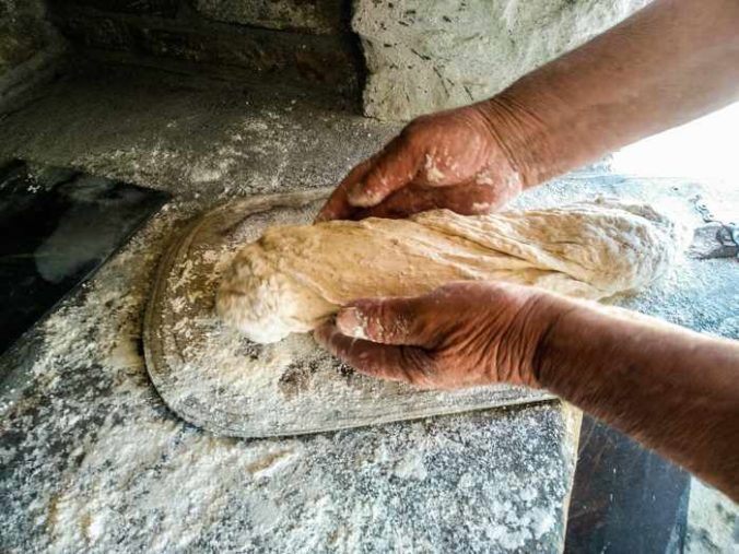 Rizes Folklore Farmstead & Restaurant Mykonos photo of a traditional bread making session