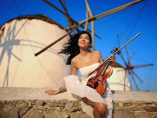 Adelon Cocktail and Sunset Bar Mykonos presents violinist Tina Psaliva