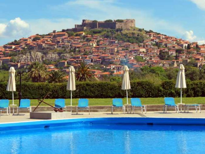 Hotel Delfinia swimming pool view of Molyvos town on Lesvos island