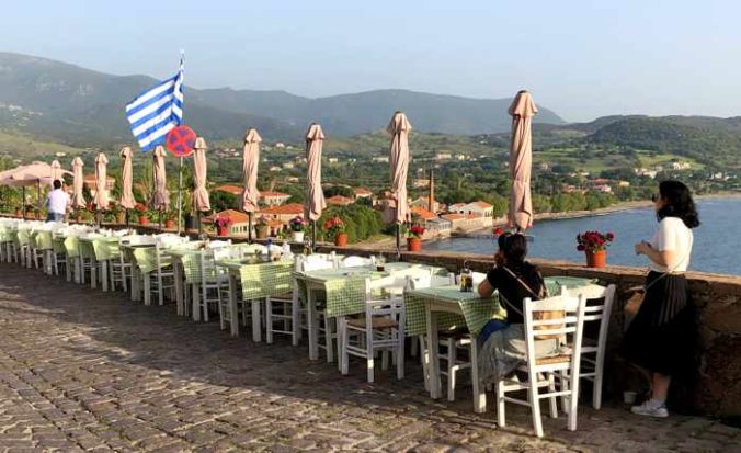 a row of taverna tables in Molyvos on Lesvos island