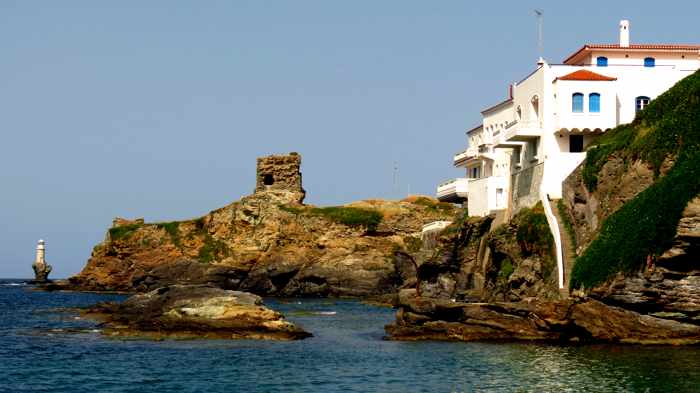 Tourlitis lighthouse ancient Kastro and mansions of Chora on Andros island 