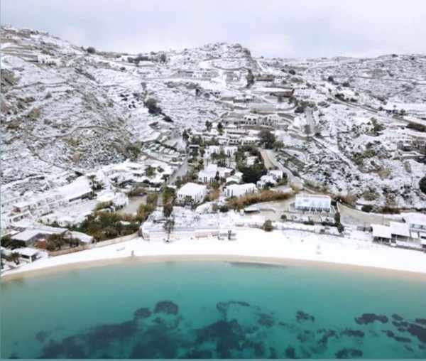 Aerial view of snow at Psarou beach on Mykonos