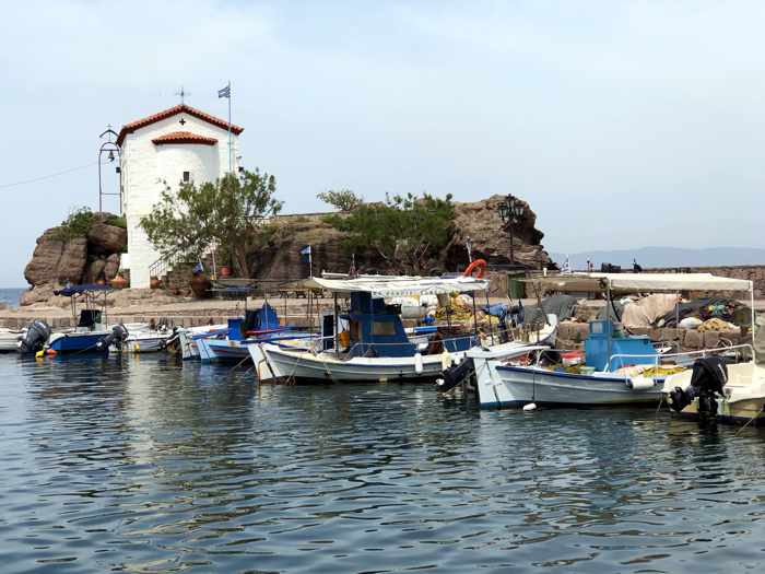fishing boats and Panagia Gorgona church at Skala Sykaminias on Lesvos