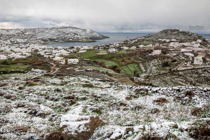 Snow dusted hillsides near Ornos Bay on Mykonos