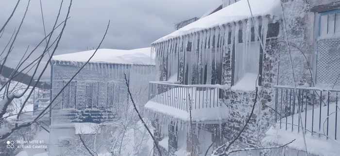 Ice and snow covered houses on Samothraki island