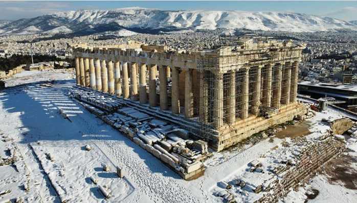 spirostheodorou photo of snow at the Athens Parthenon