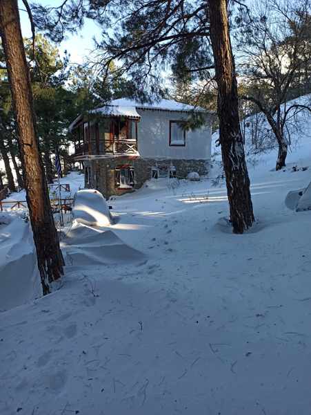 Snow covered house on Samothraki island