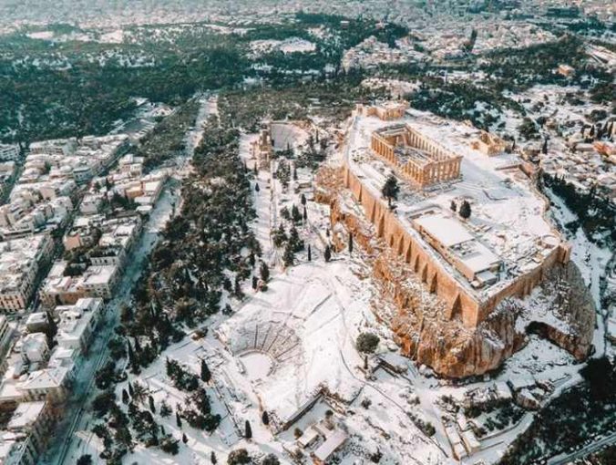 ioanniskoskoutis Instagram photo of snow on the Acropolis of Athens