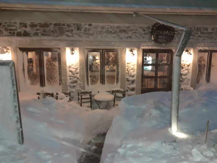 Snow outside a taverna on Samothraki island